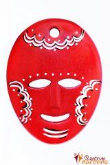 Decorative red mask with black and white trim