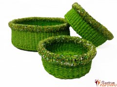 Set of green baskets with beads