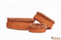 Set of orange baskets with beads
